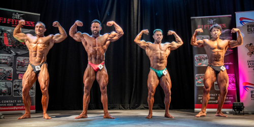 body builders performing on stage at at IFBB Australia event